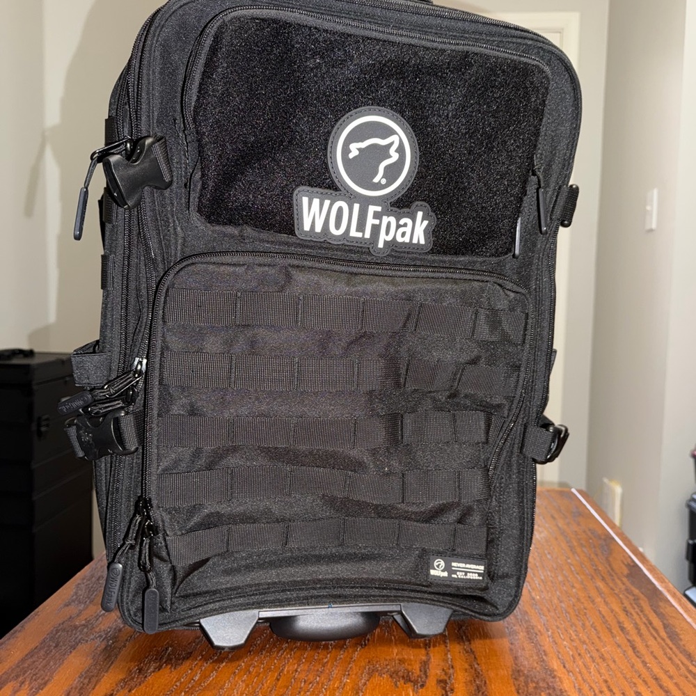 Wolfpak Black Tactical Rolling Backpack - image 1